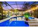 Evening view of a luxurious pool and spa area at 3901 Balsam Ct, Sarasota, FL 34243