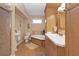 Bathroom includes a soaking tub, walk-in shower, and double vanity at 5392 Gulf Dr, Holmes Beach, FL 34217