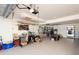 Attached garage with ample storage shelving and workbench at 5392 Gulf Dr, Holmes Beach, FL 34217