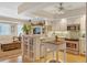 Modern kitchen with stainless steel appliances and light cabinets at 5392 Gulf Dr, Holmes Beach, FL 34217