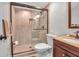 Modern bathroom with walk-in shower and updated vanity at 5420 Swift Rd # 38, Sarasota, FL 34231