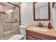 Modern bathroom with walk-in shower and updated vanity at 5420 Swift Rd # 38, Sarasota, FL 34231