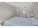 Spacious bedroom with queen-size bed and ceiling fan at 5420 Swift Rd # 38, Sarasota, FL 34231