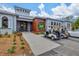 Modern clubhouse entrance with golf cart parking at 608 Misty Pond Ct, Bradenton, FL 34212