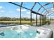 Enjoy this hot tub with a scenic golf course view at 608 Misty Pond Ct, Bradenton, FL 34212