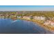 Aerial view showing building's position within the waterfront community at 6440 Mourning Dove Dr # 403, Bradenton, FL 34210