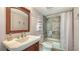 Bathroom with a shower/tub combo and updated fixtures at 6440 Mourning Dove Dr # 403, Bradenton, FL 34210