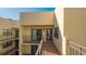 Condo building exterior showcasing entrance and balcony at 6440 Mourning Dove Dr # 403, Bradenton, FL 34210