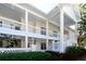 Two-story building with balconies and white columns at 6440 Mourning Dove Dr # 403, Bradenton, FL 34210