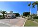 Gated entrance to the community with landscaping and security at 6440 Mourning Dove Dr # 403, Bradenton, FL 34210