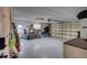 Garage interior with various items and storage solutions at 6609 Waterford Ln, Sarasota, FL 34238