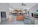 Modern living room with open floor plan and view of the kitchen at 6609 Waterford Ln, Sarasota, FL 34238