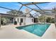 Large screened-in pool with plenty of space for relaxation and fun at 6609 Waterford Ln, Sarasota, FL 34238