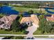 Luxury home with pool and golf course views from above at 7123 Beechmont Ter, Lakewood Ranch, FL 34202