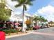 Outdoor shopping center with restaurants and parking at 7123 Beechmont Ter, Lakewood Ranch, FL 34202