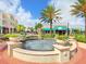 Circular fountain in a charming town square setting at 7123 Beechmont Ter, Lakewood Ranch, FL 34202