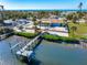 Aerial view of waterfront home with private dock and ocean views at 725 N Manasota Key Rd # A, Englewood, FL 34223