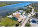 Single story home on the water with a private dock and beautiful landscaping at 725 N Manasota Key Rd # A, Englewood, FL 34223