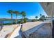 Pathway to the waterfront with a gravel area and wooden borders at 725 N Manasota Key Rd # A, Englewood, FL 34223