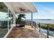 Waterfront deck with spiral staircase, offering breathtaking views at 10204 46Th W Ave, Bradenton, FL 34210