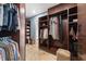 Well-organized walk-in closet with custom shelving, drawers, and ample hanging space at 10204 46Th W Ave, Bradenton, FL 34210