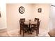 Cozy dining area with round table and four chairs at 1416 Glenmere Dr, Brandon, FL 33511