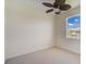 Bright bedroom with ceiling fan and water view at 15124 Leipzig Cir, Port Charlotte, FL 33981