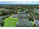 Aerial view of tennis courts and pickleball courts at 27475 Janzen Ct, Englewood, FL 34223