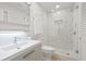 Clean bathroom with white vanity and walk-in shower at 3330 Gulf Of Mexico Dr # 205D, Longboat Key, FL 34228