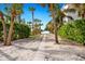 Private beach access path, lush landscaping at 3330 Gulf Of Mexico Dr # 205D, Longboat Key, FL 34228