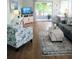 Living room with hardwood floors and plenty of natural light at 4705 5Th W St # 306, Bradenton, FL 34207