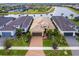 Aerial view of single-Gathering home with tile roof at 4925 Surfside Cir, Bradenton, FL 34211