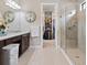 Bathroom with walk-in shower and large closet at 4925 Surfside Cir, Bradenton, FL 34211