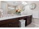 Double vanity bathroom with granite countertop at 4925 Surfside Cir, Bradenton, FL 34211