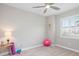 Small bedroom with pink exercise ball at 4925 Surfside Cir, Bradenton, FL 34211