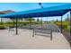 Enjoy bocce ball under a covered area with benches at 4925 Surfside Cir, Bradenton, FL 34211