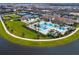 Resort-style community pool with tennis courts at 4925 Surfside Cir, Bradenton, FL 34211