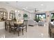 Dining room with a wooden table and chairs, view to living room at 4925 Surfside Cir, Bradenton, FL 34211