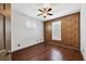 Bright bedroom featuring wood floors and accent wall at 5581 Key West Pl # 5581, Bradenton, FL 34203