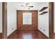 Home office with wood floors and built-in shelving at 5581 Key West Pl # 5581, Bradenton, FL 34203