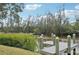 Private dock offering serene waterfront access at 609 Colonial Bay Dr, Nokomis, FL 34275