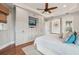 Spacious main bedroom with large closet, hardwood floors and ensuite bathroom at 609 Colonial Bay Dr, Nokomis, FL 34275