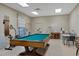 Recreation room features a pool table, exercise equipment, and work tables at 6100 Green View Dr # 145, Sarasota, FL 34231