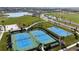 Aerial view of community tennis and basketball courts at 9153 Radiant Cir, Sarasota, FL 34241