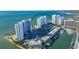 Aerial view of waterfront property with luxurious high-rise condos and marina at 988 Blvd Of The Arts # 915, Sarasota, FL 34236