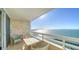 Spacious balcony with water views and seating area at 988 Blvd Of The Arts # 915, Sarasota, FL 34236