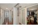 Large walk-in closet with mirrored doors and ample shelving at 988 Blvd Of The Arts # 915, Sarasota, FL 34236