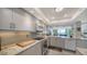 Modern kitchen with granite countertops and stainless steel appliances at 988 Blvd Of The Arts # 915, Sarasota, FL 34236