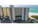 Oceanfront building, featuring balconies and beach access at 19 Whispering Sands Dr # 1204, Sarasota, FL 34242