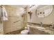 Bathroom features a walk-in shower and granite vanity at 19 Whispering Sands Dr # 1204, Sarasota, FL 34242